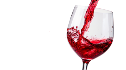 Red wine pouring in glass 
