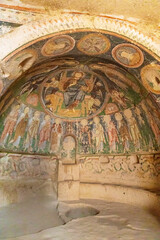Close up frescoes on a wall of cave church. View of ceiling with fresco painting in a cave church....