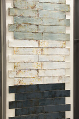 Samples of tile colors display in store