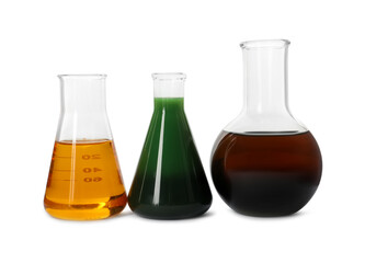 Flasks with different types of oil isolated on white