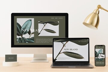 Digital device set, minimal workspace, showing plant shop website