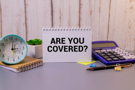 Are you covered symbol. Concept words Are you covered on wooden blocks.