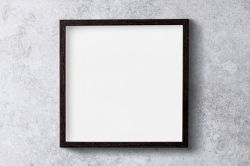 Blank frame on grunge wall, loft interior design