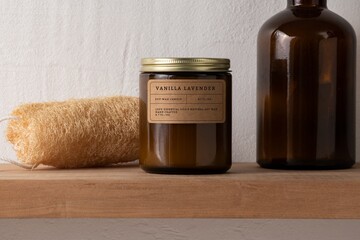 Candle on shelf, aromatic product, home spa decor