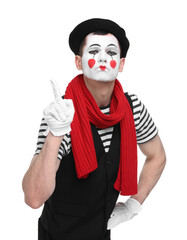 Funny mime artist gesturing on white background