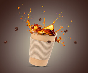 Aromatic coffee in takeaway paper cup and roasted beans in air on brown gradient background
