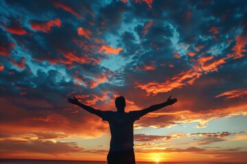 Fototapeta premium Fields of Radiance: A Man Standing in a Sunlit Field with the Setting Sun Behind Him.