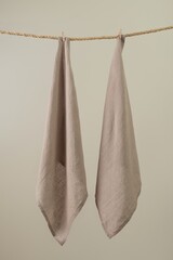 Beige handkerchief, realistic fabric hanging from a rope