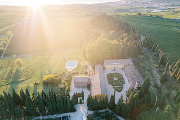 Ancient villa Cordevigo with a swimming pool on a lawn surrounded by vineyards. Veneto, Italy