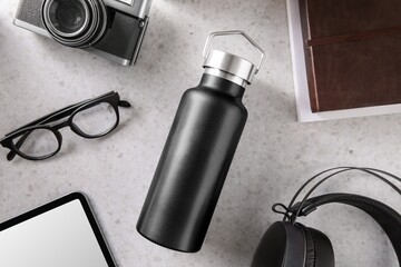 Black thermal water bottle, product with blank design space