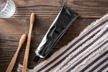 Minimal black toothpaste tube, oral care product with blank space