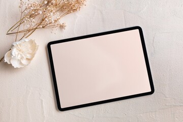 Tablet with blank pink screen, flat lay design