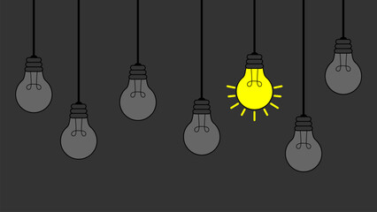 the hanging light bulb on black background