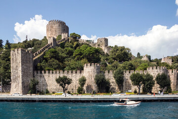 A boat sails past the Rumelian Castle