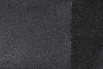 Fototapeta premium Black background, folded paper texture design