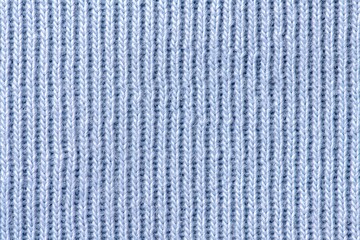 Blue knitted fabric texture background, macro shot