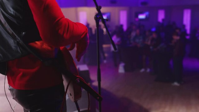 bass guitarist, bass player, bassist, bass guitar, bass, acoustic, artist, background, band, club, concert, dance, electric, electric guitar, entertainment, event, festival, finger, guitar, guitarist,