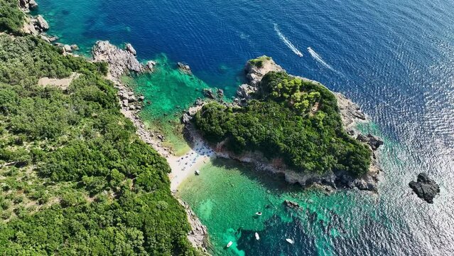 Limni beach glyko on corfu island, shimmering ionic sea and lush greenery, aerial view