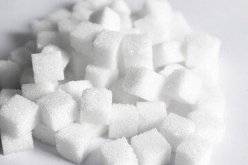 Sugar cubes on a white background Sugar industry business