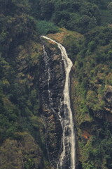 lush green nilgiri mountains and beautiful catherine waterfall from dolphin nose view point of coonoor near ooty hill station in tamilnadu, india