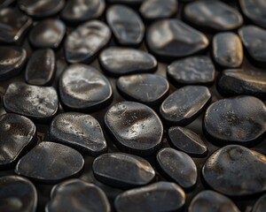 A closeup photo of a bed of smooth black pebbles, some wet and glistening, with a grainy background concept 3D rendering 
