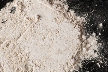 Beige sand texture, black background, design space