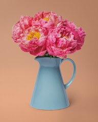 Pink peonies in blue vase, flower arrangement, home decor