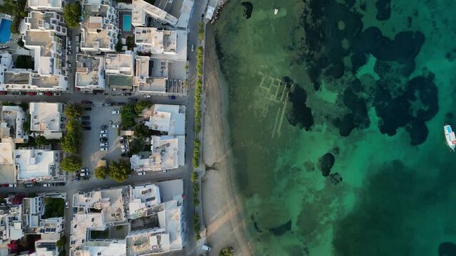 Aerial footage of the town and port of Parikia on the island of Paros, one of the many Cyclades Islands in the Aegean Sea.