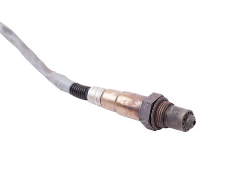 Lambda probe - oxygen sensor device designed to record tamount of remaining oxygen in the exhaust gas of car engine is located in exhaust system. Metal spare part for replacement to repair in workshop