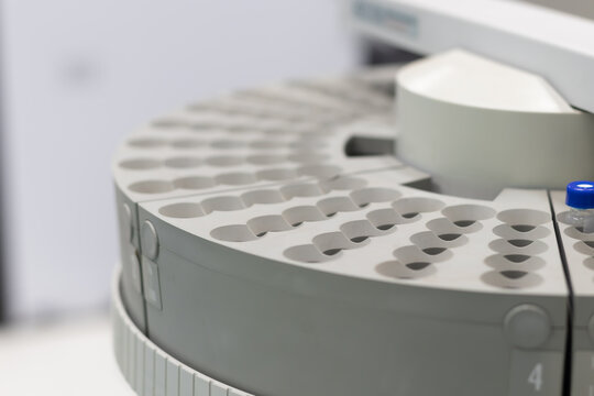 autosampler of gas chromatography instrument in chemistry, gc, hplc, chemical, glassware., close up