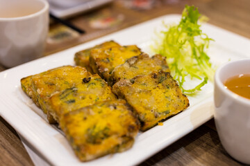 Egg with vegetable cake in the restaurant