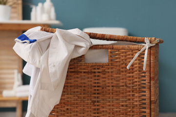 Full laundry basket in room, closeup