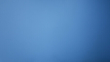 Light blue wall background. Abstract blue gradient wall for background work