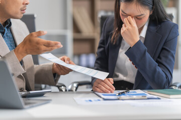Asian businesswoman and businessman facing workplace challenges. From age diversity to handling mistakes and consequences like bankruptcy, emphasizing accountability, and learning from errors.