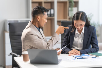 Asian businesswoman and businessman facing workplace challenges. From age diversity to handling...