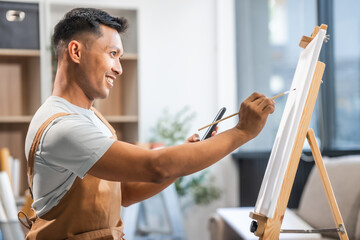Middle-aged Asian man, skilled painting artist, donning an apron. Proficient in art, creativity, inspiration, and canvas work, utilizing various tools to express imagination.
