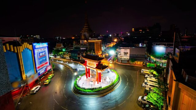 Time lapse Odeon Circle and Chinese gate. Chinatown, Bangkok.
beautiful lighting in the night.   
long exposure at the Odeon circle the Gate of China town at Yaowarat road.