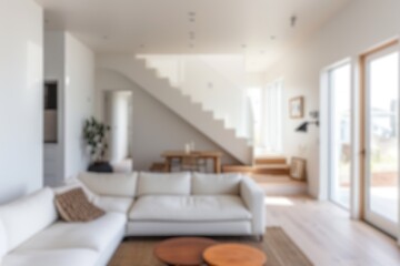Naklejka na ściany i meble Defocused shot of a bright, airy Scandinavian-style living space with minimalist design. Resplendent.