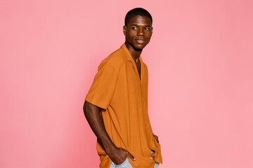 Man wearing orange short sleeve shirt