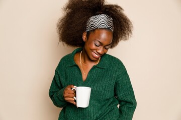 Black woman drinking coffee for breakfast