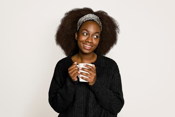 Happy woman drinking coffee for breakfast