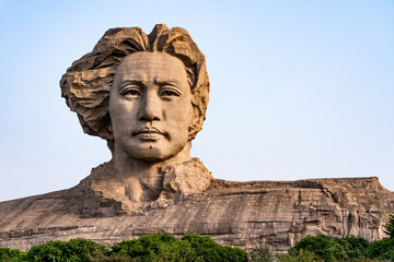 The Yuelu Mountain Scenic Area of Juzizhou Head in Changsha City, Hunan Province, China, features Mao Zedong Youth Sculpture