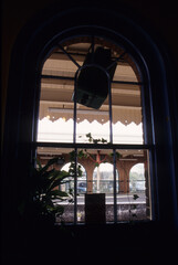 vertical image, view of outside from interior room aspect.  Exterior platform details. Location Woodbridge Railway station Suffolk UK 2003
