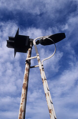 vertical image. Railway safety lights on double poles. Location Woodbridge Railway station Suffolk UK 2003