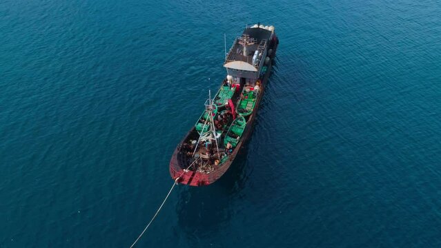 Aerial shot of illegal Chinese fishing vessel at anchor, apprehended after being caught fishing inside Palau's National Marine Sanctuary.