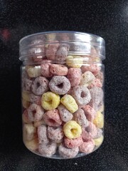 Plastic jar with colorful cereal