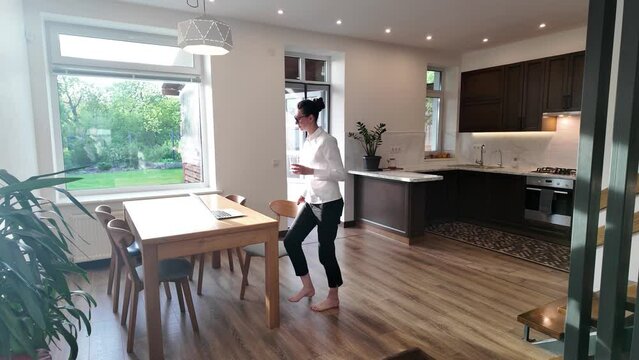 Business woman in modern private home interior