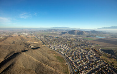 Morning aerial view from hot air balloon of housing in Winchester southern California United States