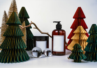 dark jar with lid and dispenser on the background of Christmas decorations, side view