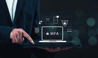 Multiple factor authentication MFA method using portable devices to protect data and account on internet data security concept, businessman using tablet with secure computer technology graphics icon.